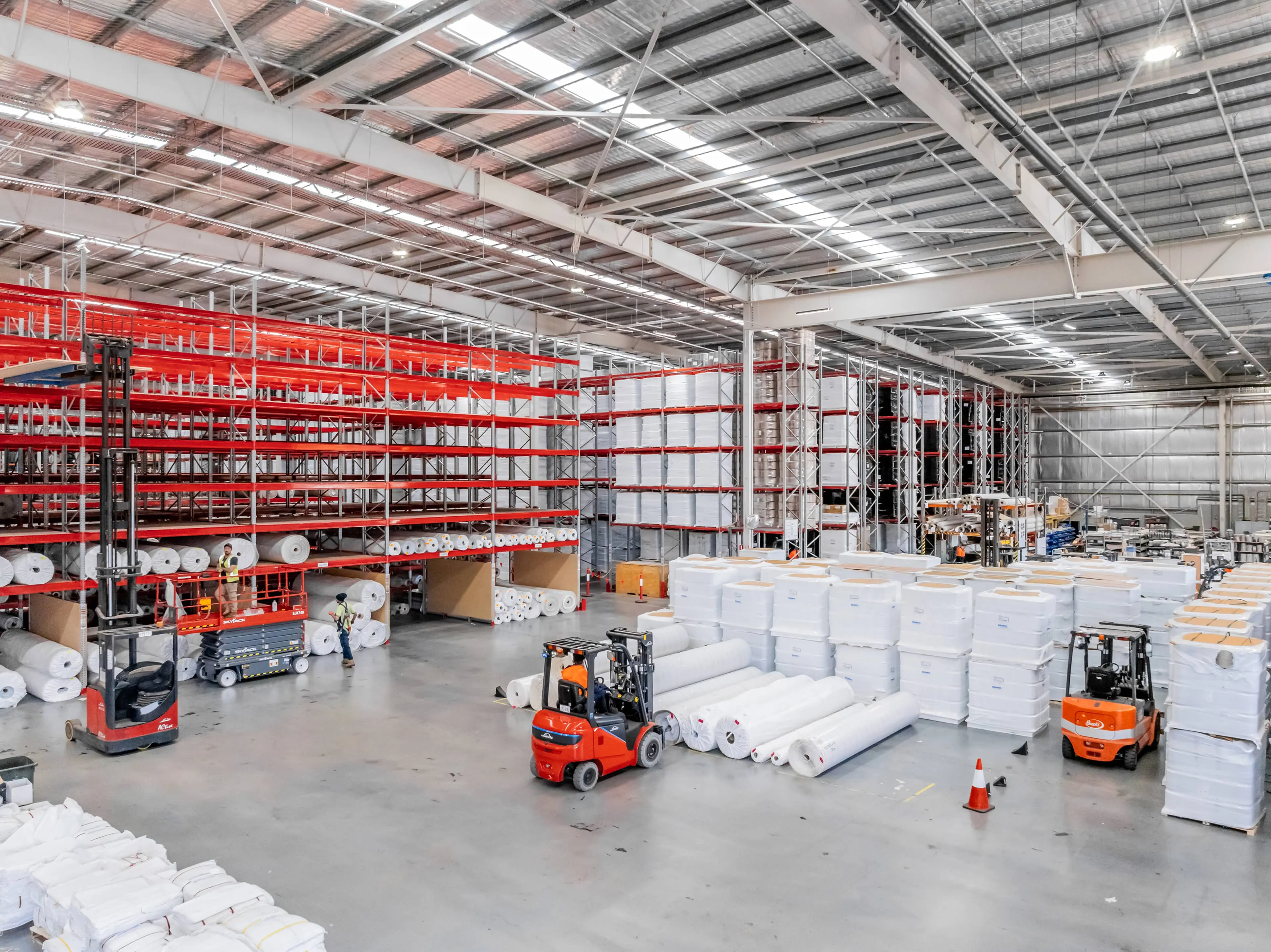 Tall pallet racking using vertical warehouse space for pallet storage.