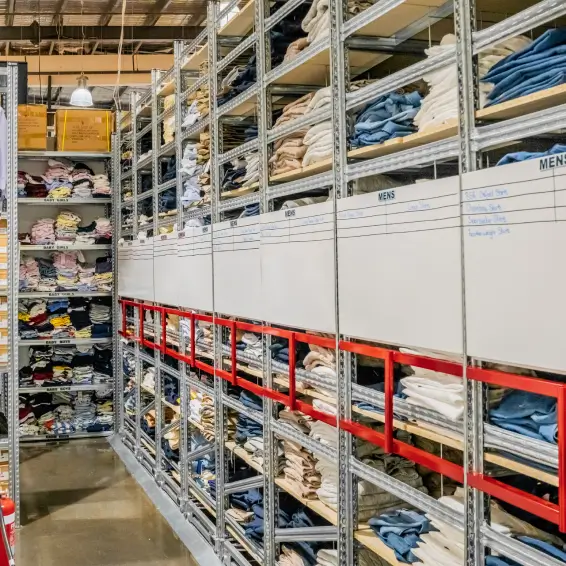 Delivery truck transporting pallet racking systems and warehouse equipment