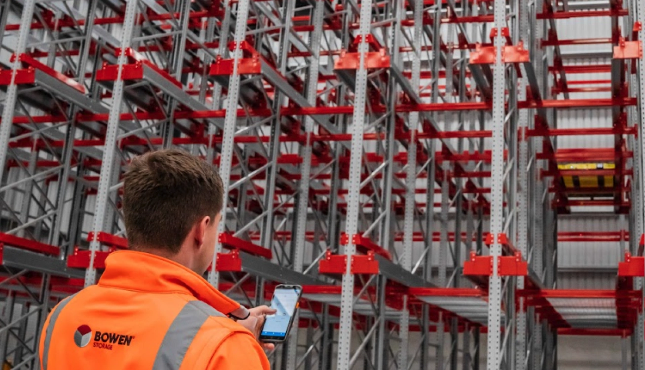 High-density mobile racking system with steel frames for compact warehouse storage