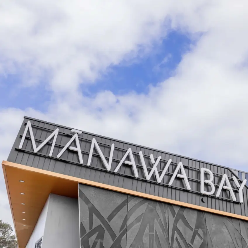 Manawa Bay retail outlet exterior with modern commercial building signage and facade design