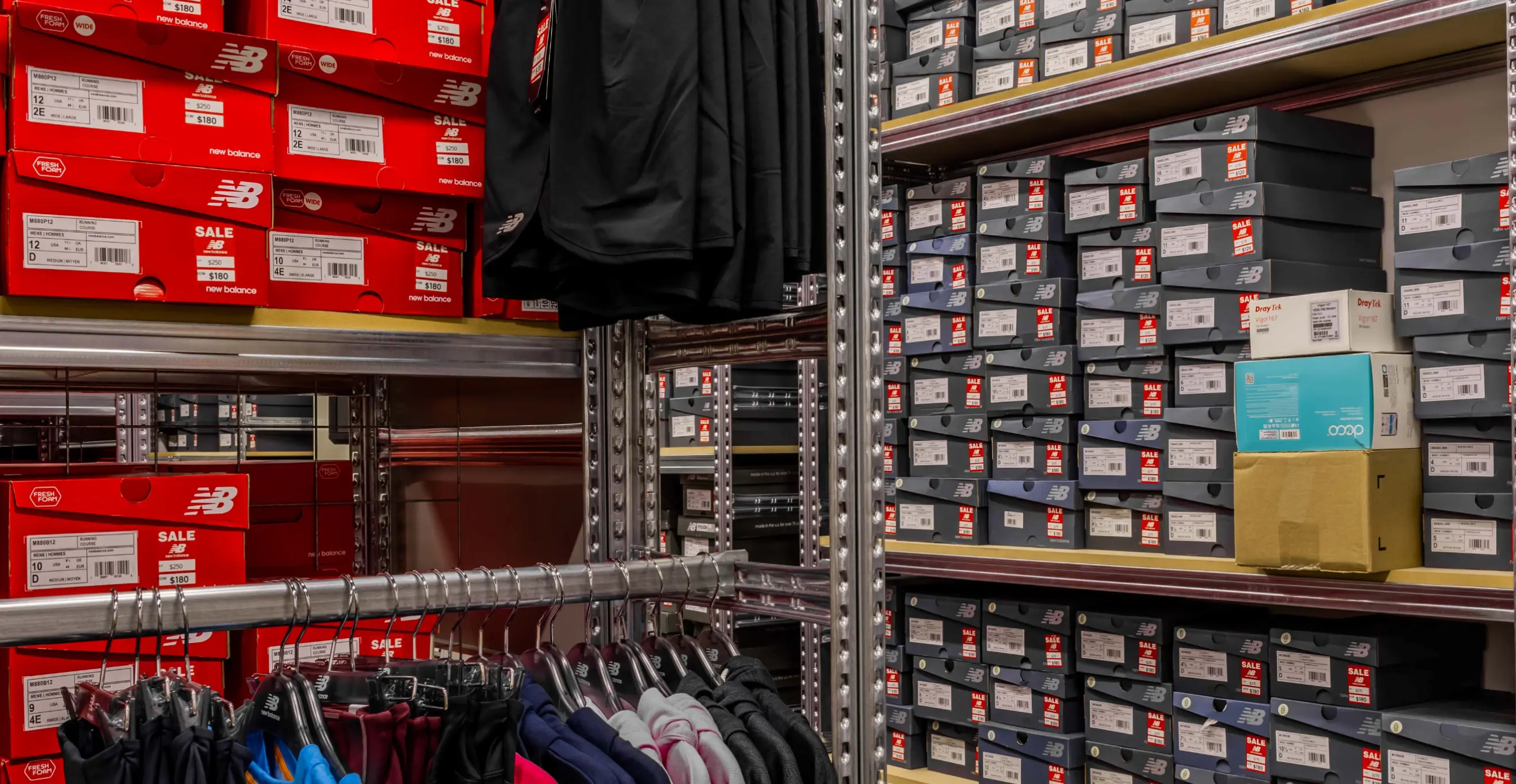 Retail stockroom fitout with garment hanging system and long span shelving for footwear storage