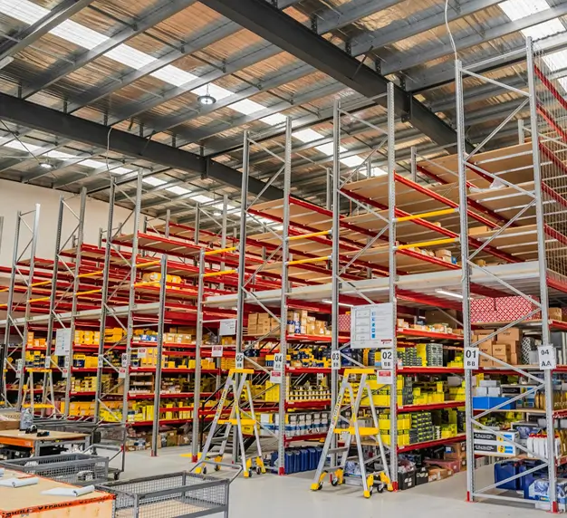 Industrial pallet racking system for automotive parts warehouse storage at Imparts facility