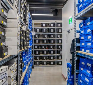 Adidas retail stockroom fitout with compactus and static shelving for footwear and apparel storage
