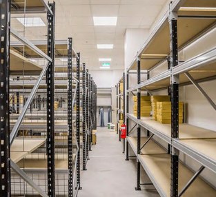 Michael Kors luxury retail stockroom with BL2000 longspan shelving and mesh backing panels